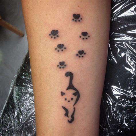 cat paw print tattoo